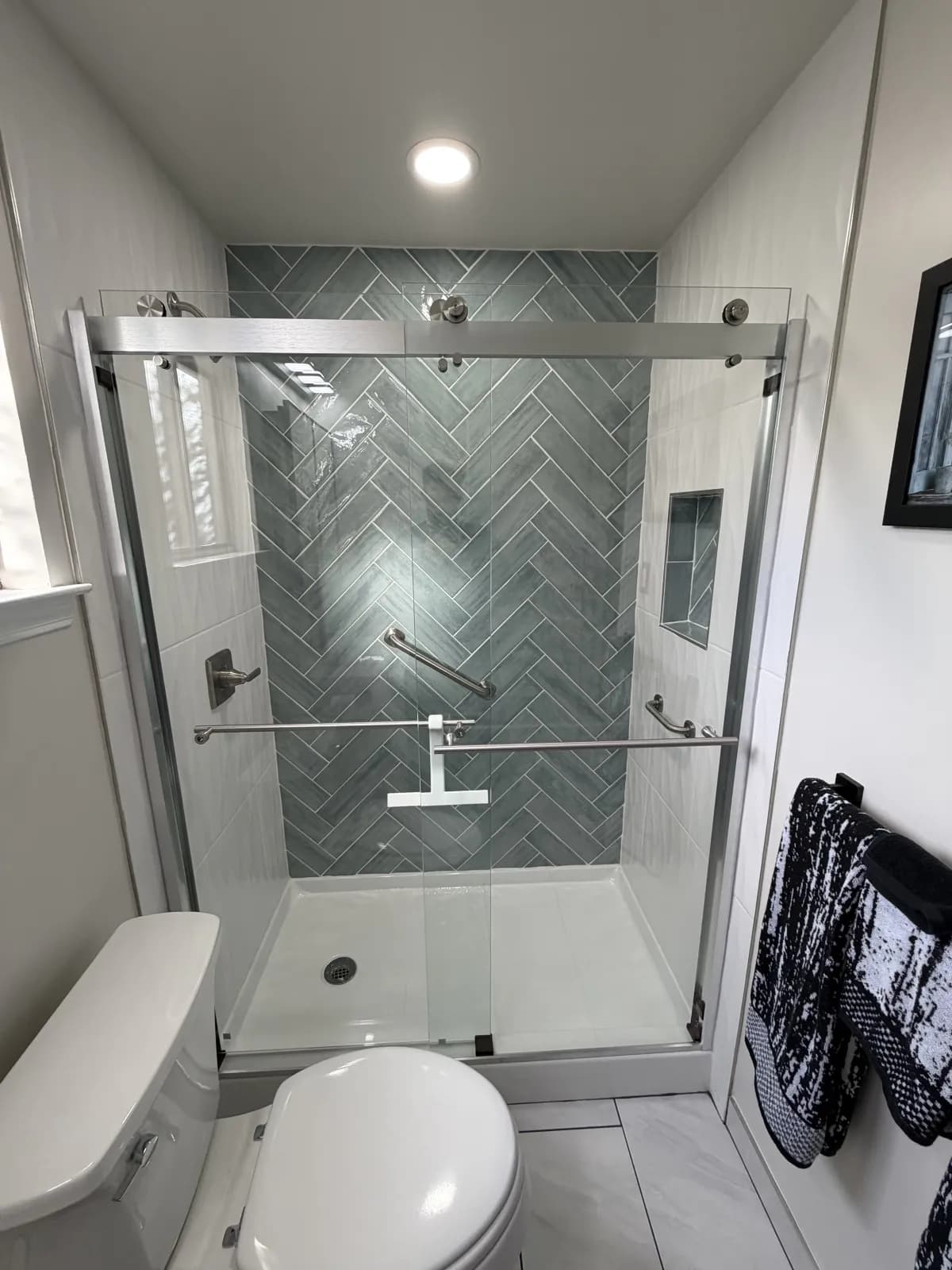 Herringbone Tile Shower & Full Bathroom Remodel